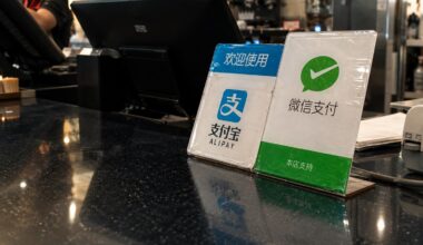 Alipay and WeChat Pay signs on counter
